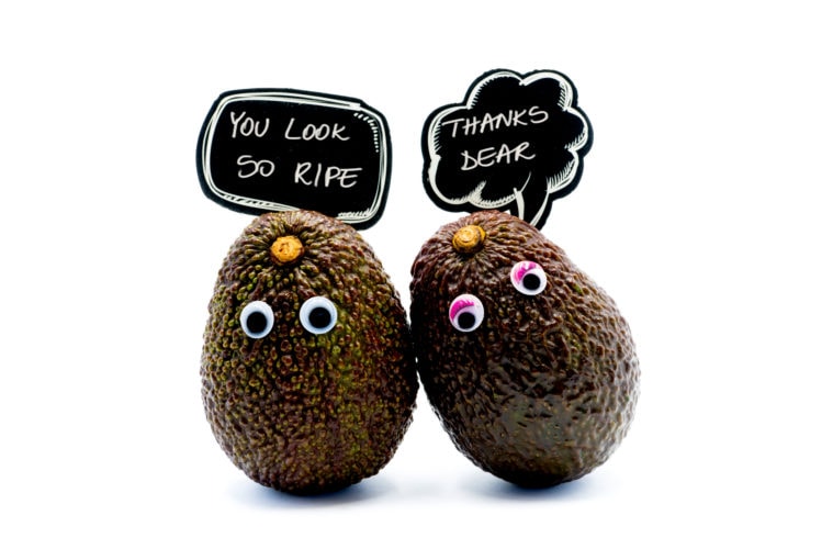 Two avocados complimenting each other representing compliments for girls that actually work