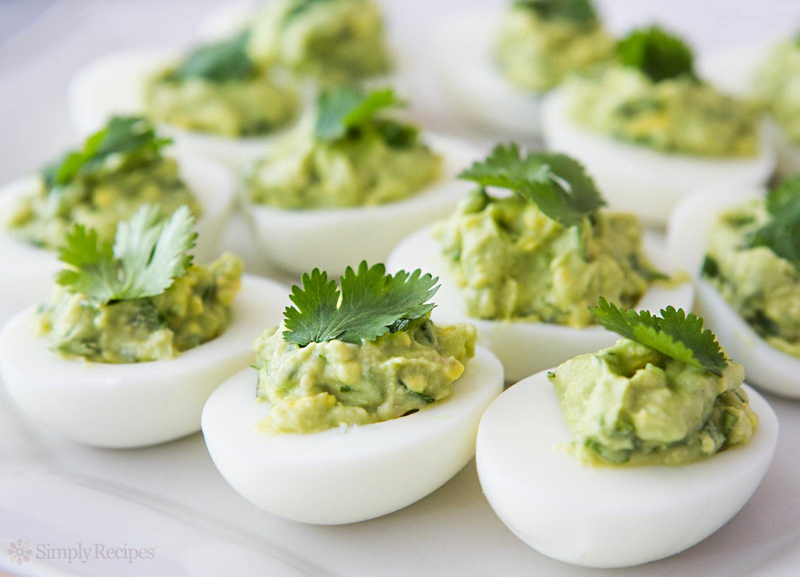 guacamole deviled eggs look fancy and and they're very healthy